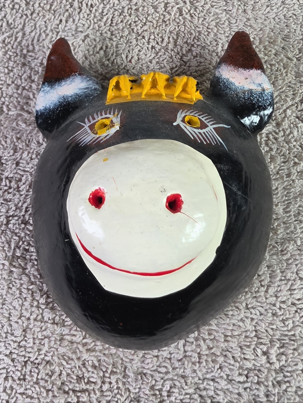 Handcrafted Black and White Coconut Shell Cow Wall Art with Yellow Accent
